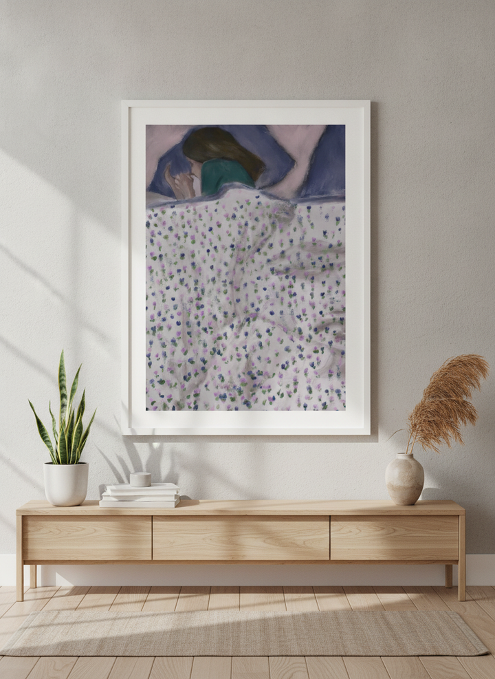 Modern wall art styled above a sofa in a neutral living room