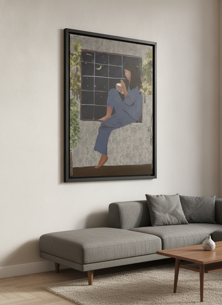 Modern wall art styled above a sofa in a neutral living room