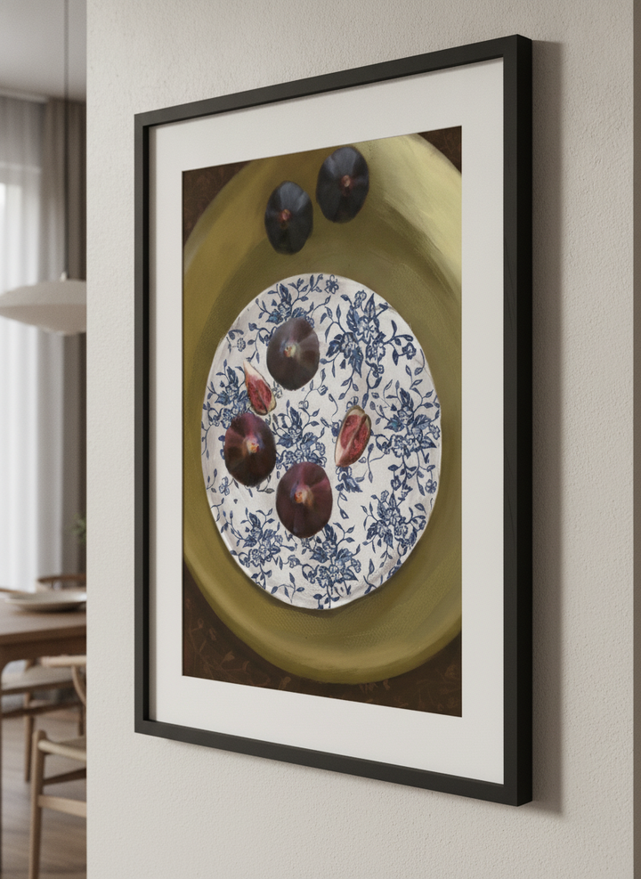 Wall art styled above a dining table in a contemporary home