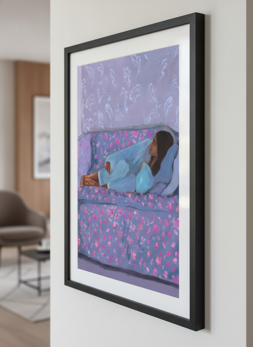 Modern wall art styled above a sofa in a neutral living room