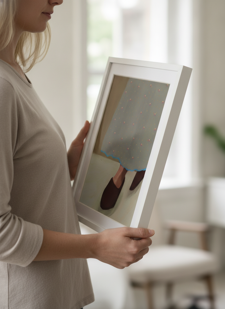 Person showcasing the artwork against a clean modern interior wall