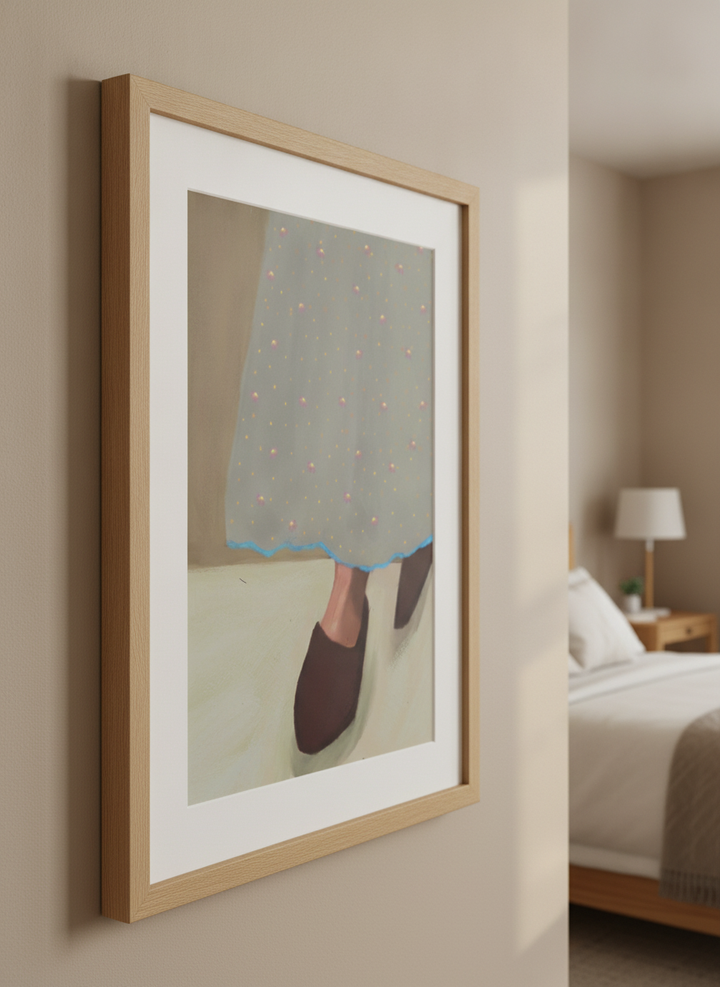 Minimalist artwork displayed in a calm, light-filled bedroom interior