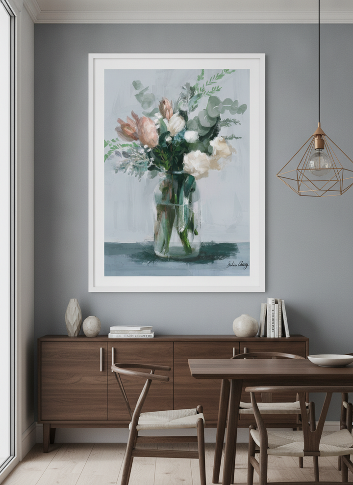 Wall art styled above a dining table in a contemporary home