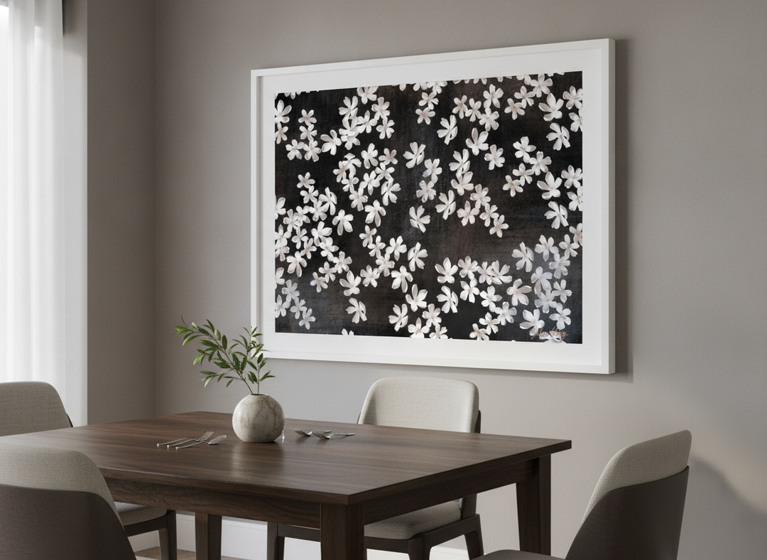 Wall art styled above a dining table in a contemporary home