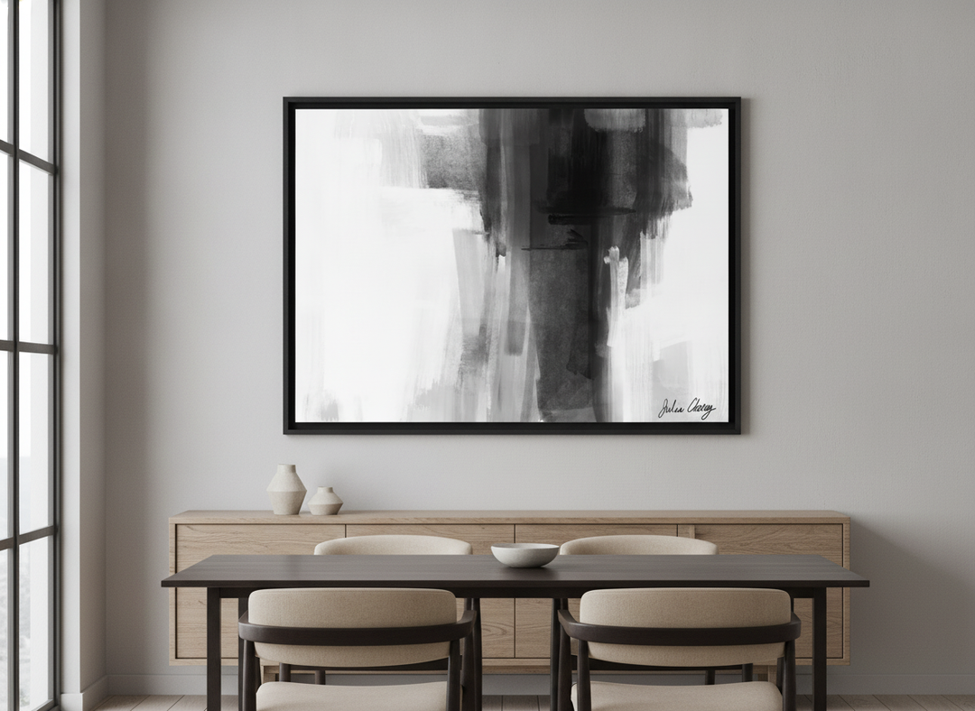 Wall art styled above a dining table in a contemporary home