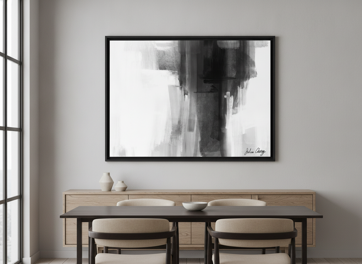 Wall art styled above a dining table in a contemporary home