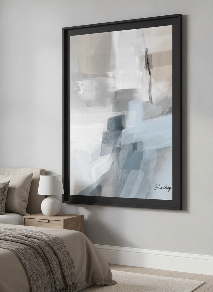 Minimalist artwork displayed in a calm, light-filled bedroom interior