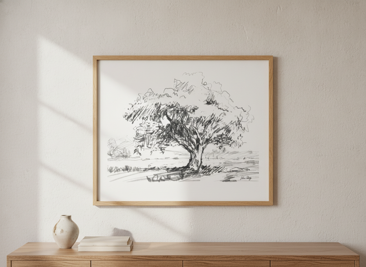 Wall art styled above a dining table in a contemporary home
