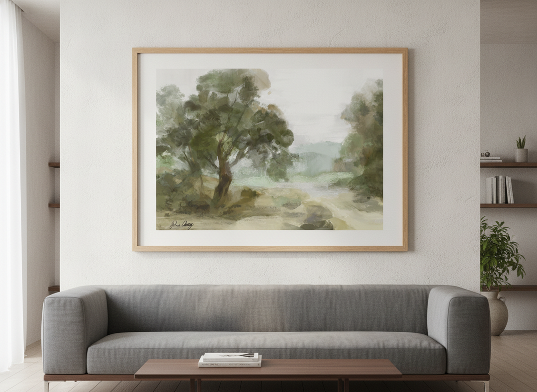 Modern wall art styled above a sofa in a neutral living room