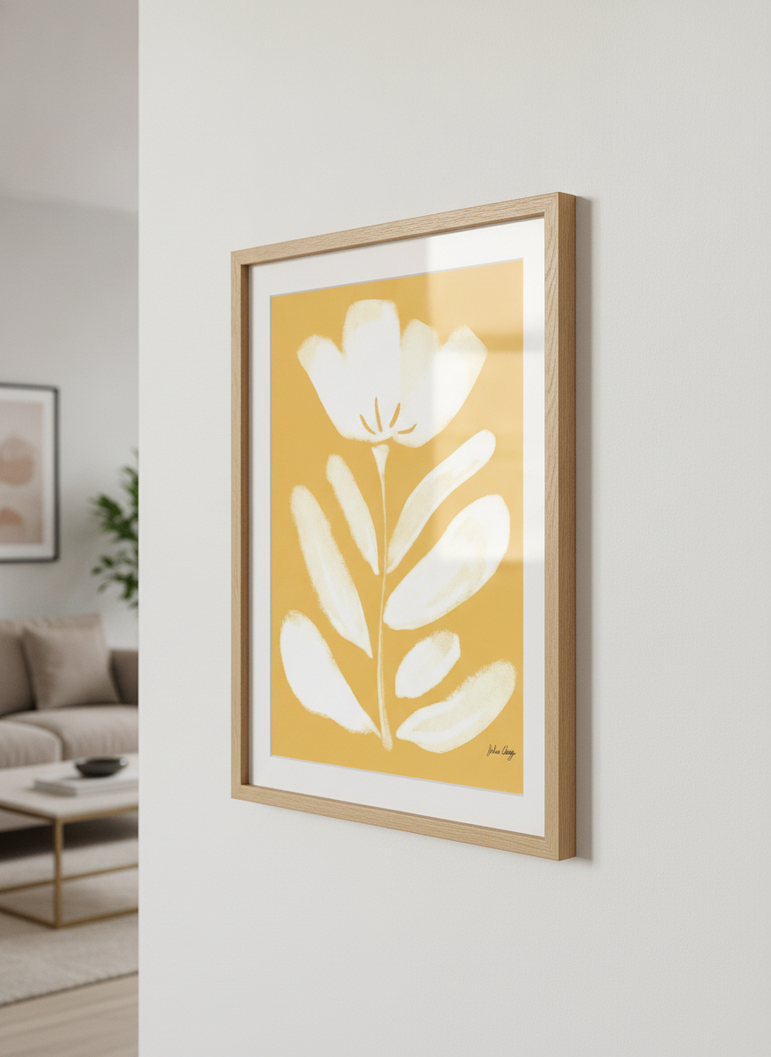 Modern wall art styled above a sofa in a neutral living room