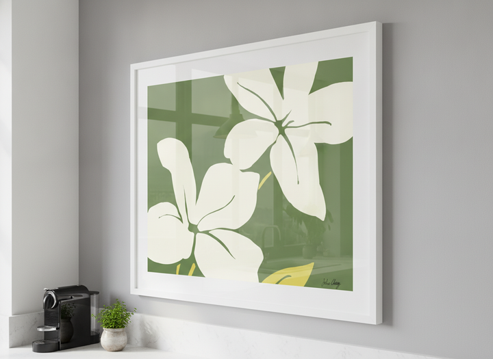 Artwork styled on the wall of a bright modern kitchen