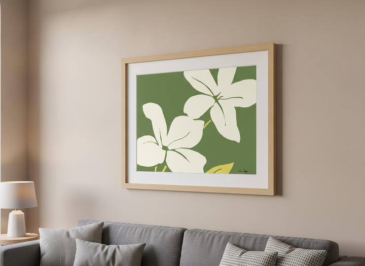 Modern wall art styled above a sofa in a neutral living room
