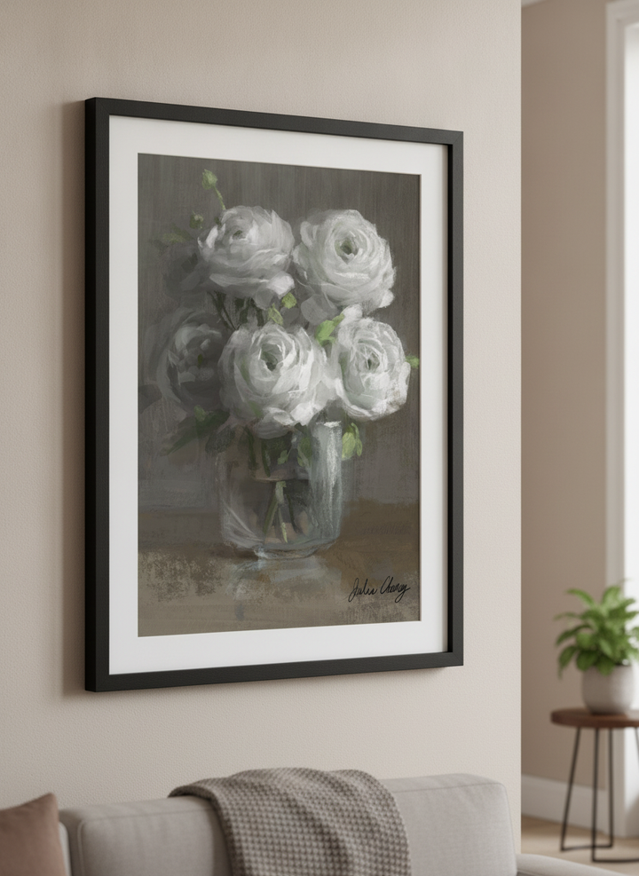 Modern wall art styled above a sofa in a neutral living room