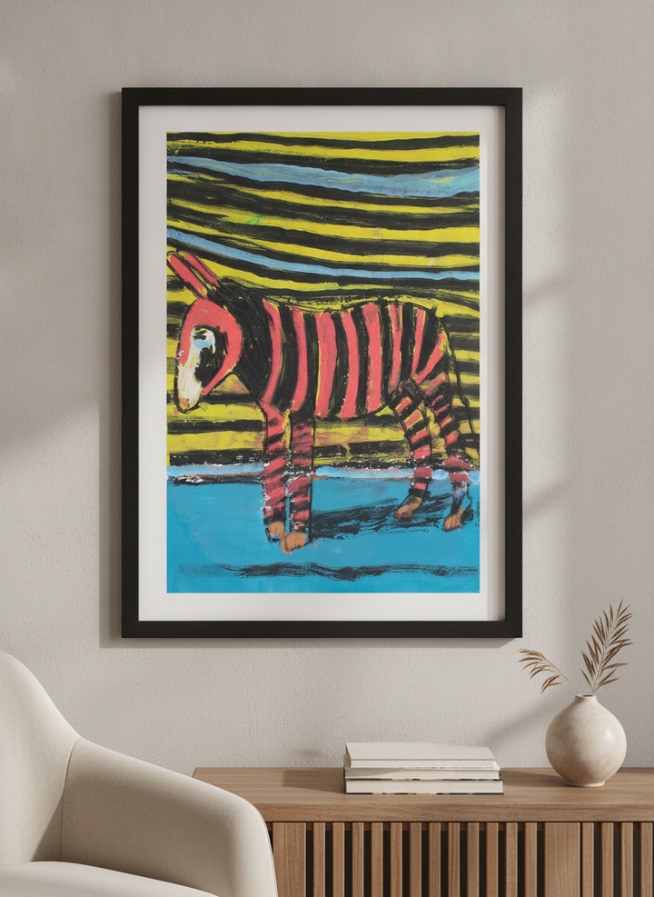 Modern wall art styled above a sofa in a neutral living room