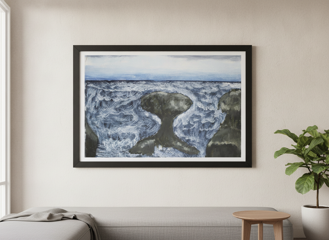 Modern wall art styled above a sofa in a neutral living room