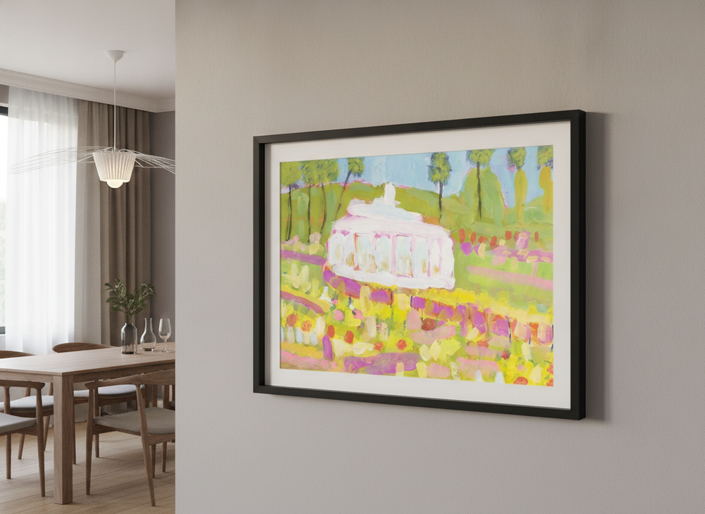 Wall art styled above a dining table in a contemporary home