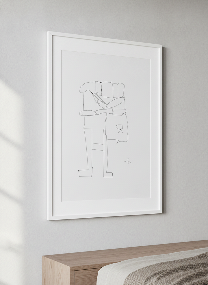 Minimalist artwork displayed in a calm, light-filled bedroom interior