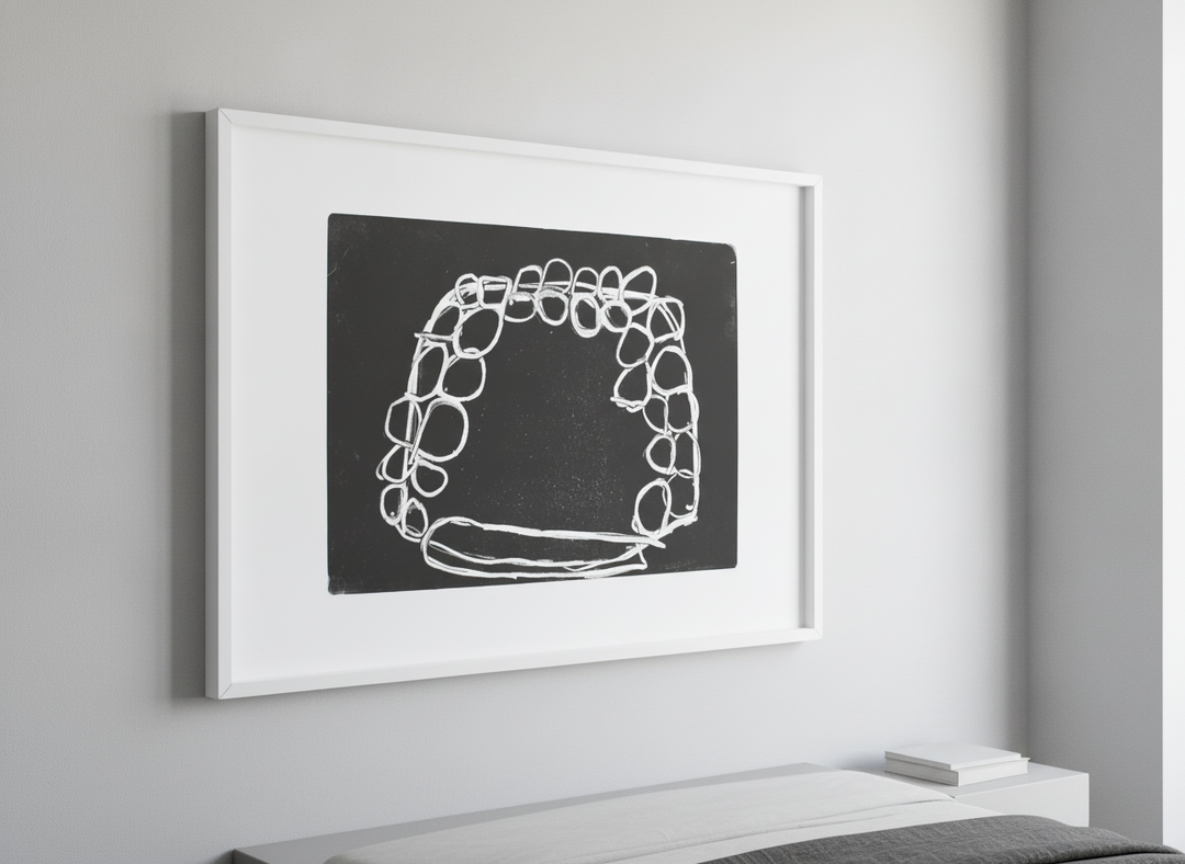 Minimalist artwork displayed in a calm, light-filled bedroom interior