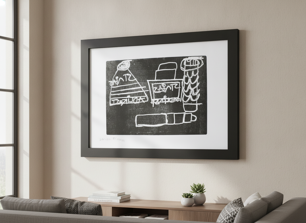 Modern wall art styled above a sofa in a neutral living room