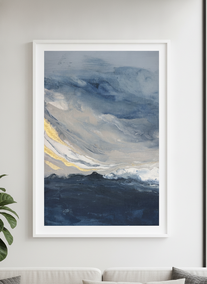 Modern wall art styled above a sofa in a neutral living room