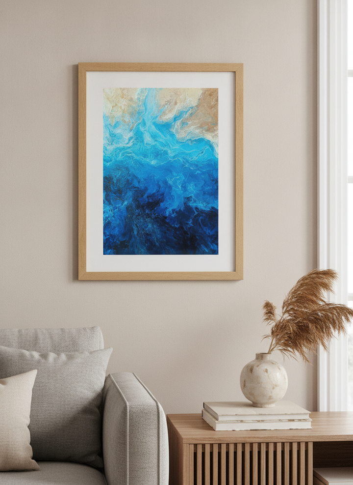 Modern wall art styled above a sofa in a neutral living room