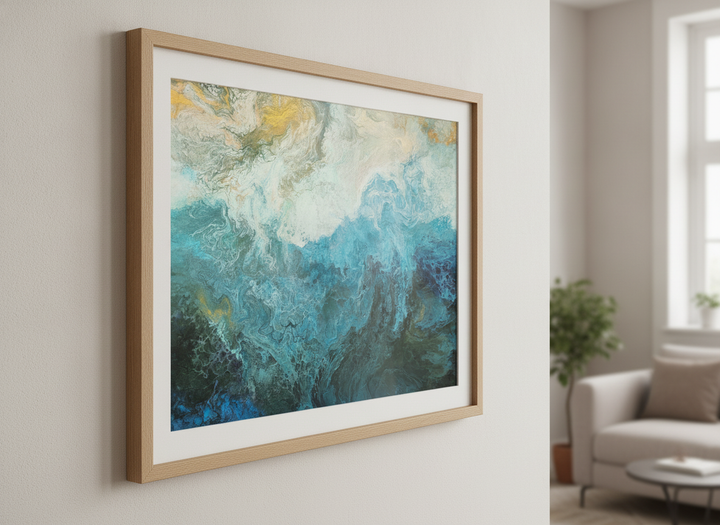 Modern wall art styled above a sofa in a neutral living room