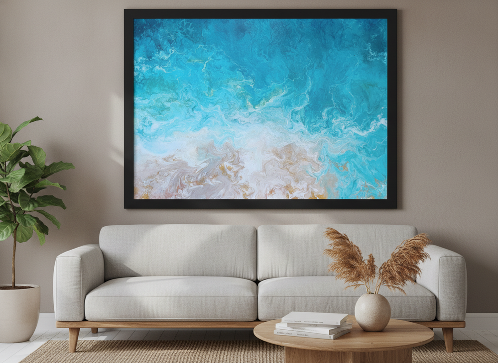 Modern wall art styled above a sofa in a neutral living room