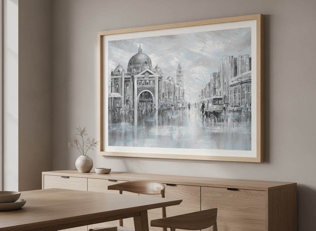 Wall art styled above a dining table in a contemporary home