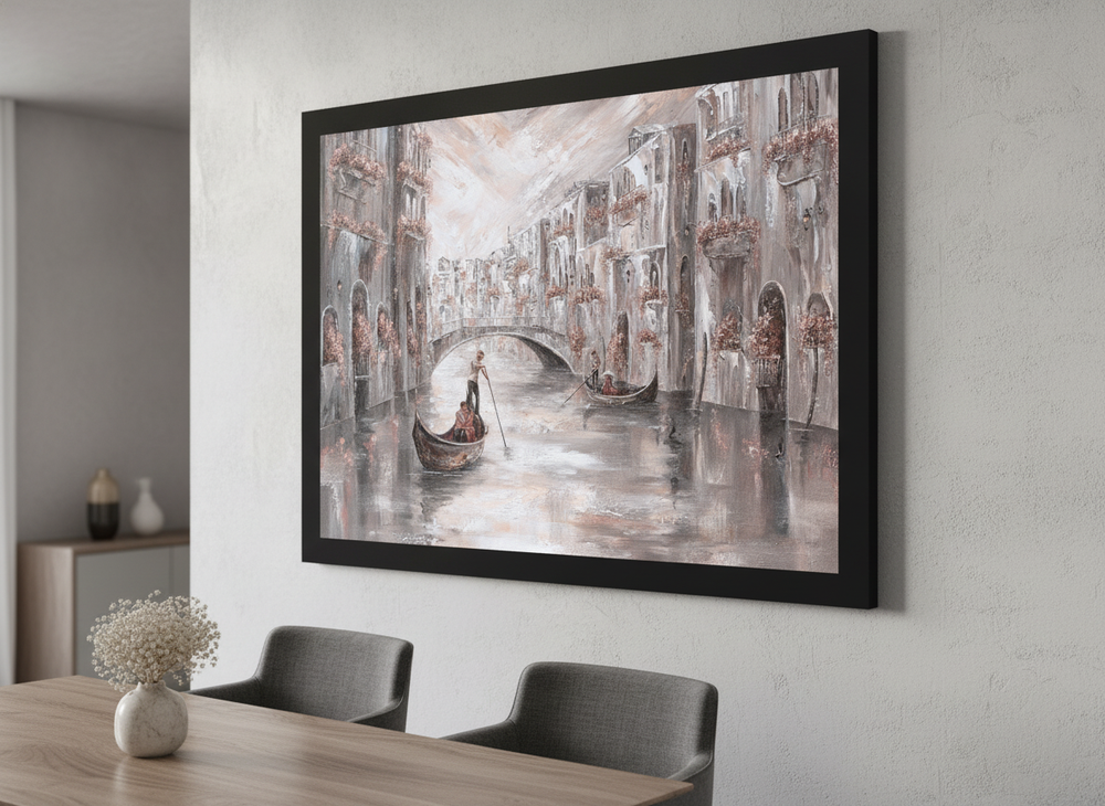Wall art styled above a dining table in a contemporary home