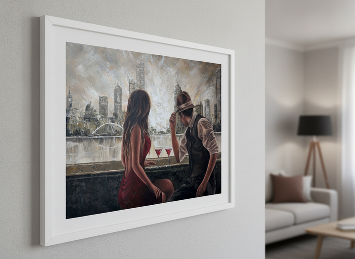 Modern wall art styled above a sofa in a neutral living room