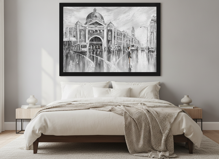 Minimalist artwork displayed in a calm, light-filled bedroom interior