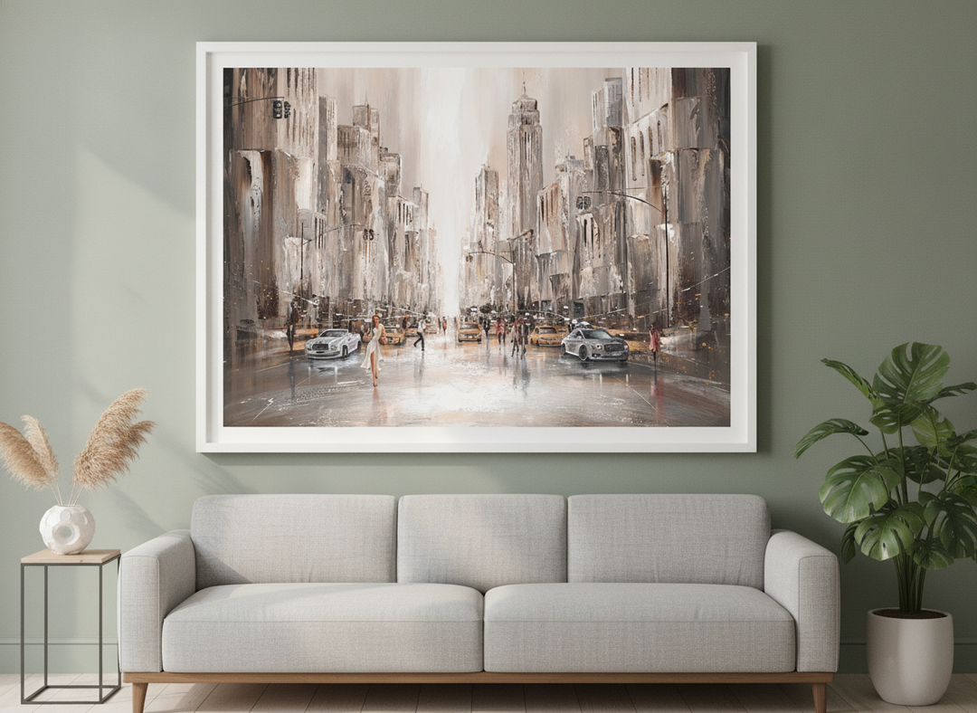 Modern wall art styled above a sofa in a neutral living room