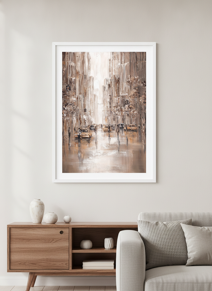 Modern wall art styled above a sofa in a neutral living room