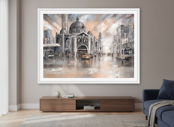 Modern wall art styled above a sofa in a neutral living room