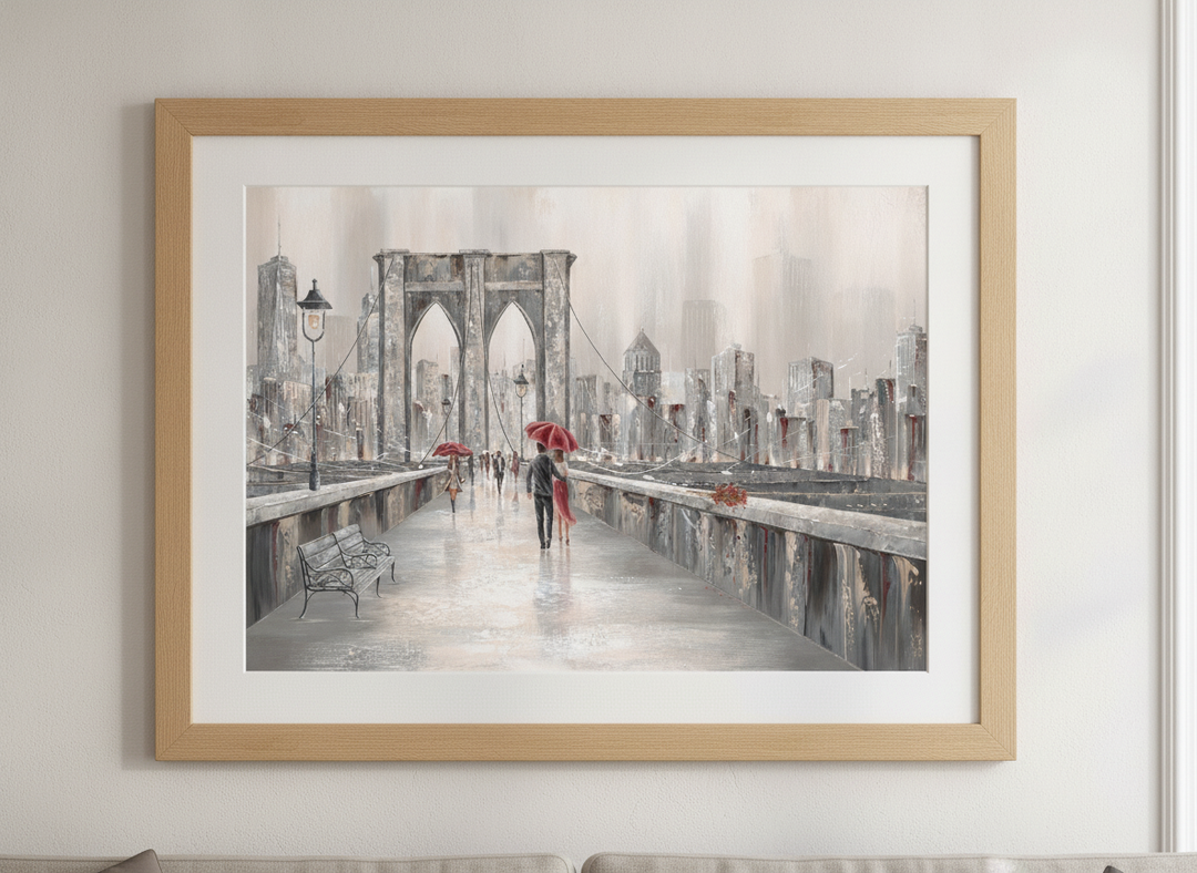 Modern wall art styled above a sofa in a neutral living room