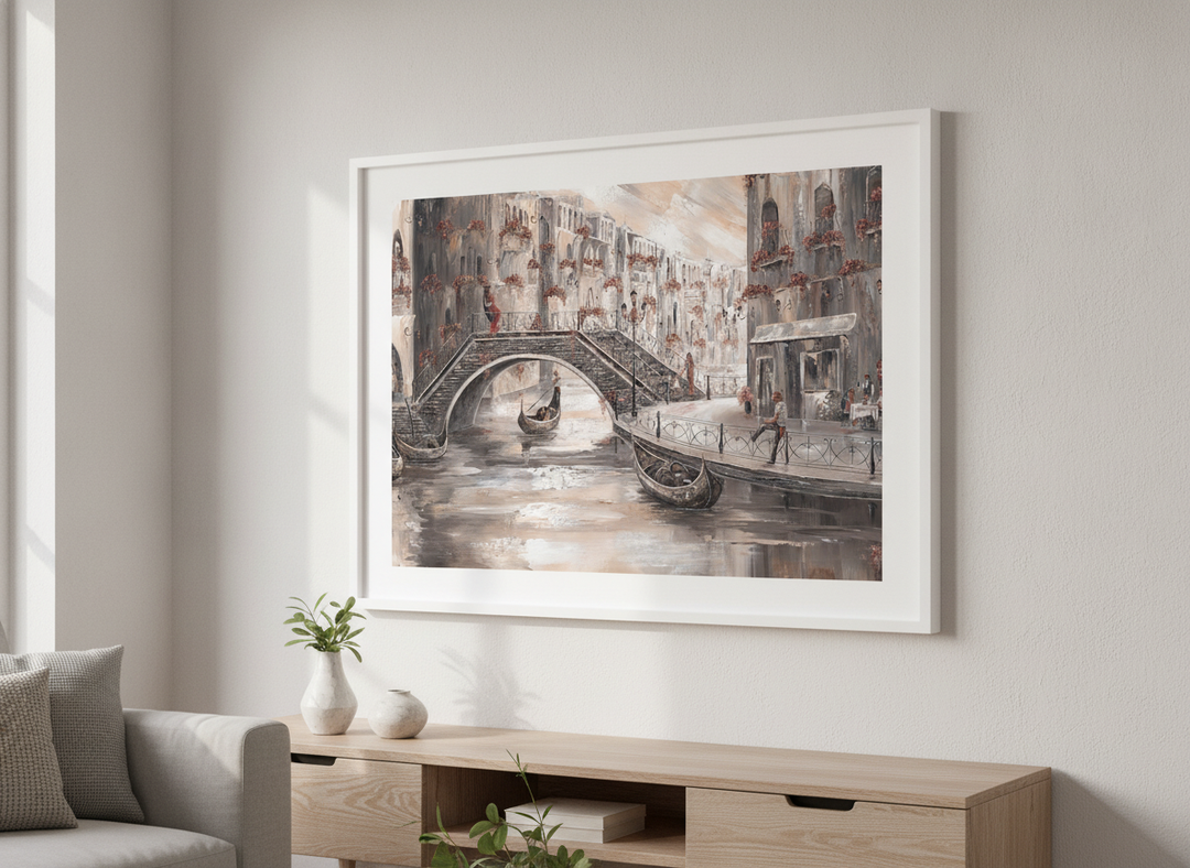 Modern wall art styled above a sofa in a neutral living room