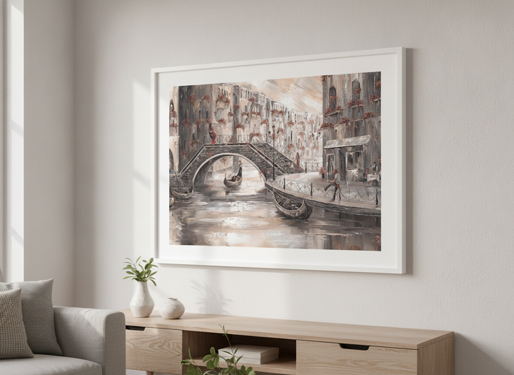Modern wall art styled above a sofa in a neutral living room