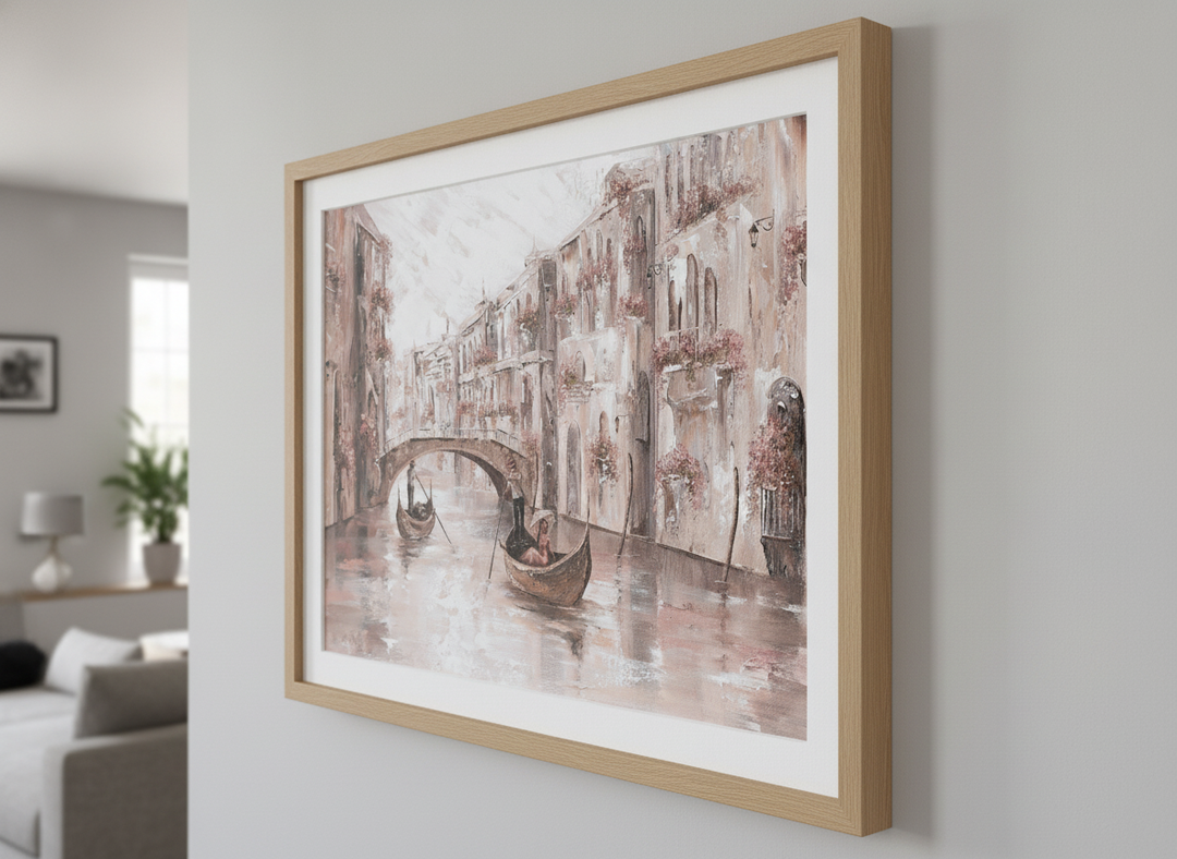 Modern wall art styled above a sofa in a neutral living room