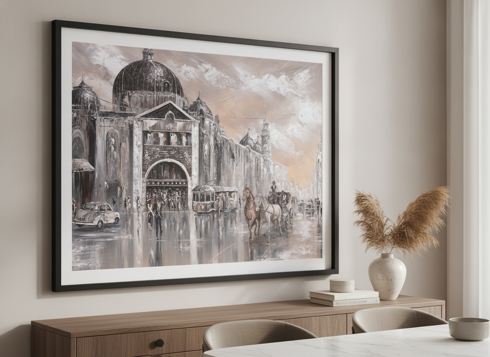 Wall art styled above a dining table in a contemporary home