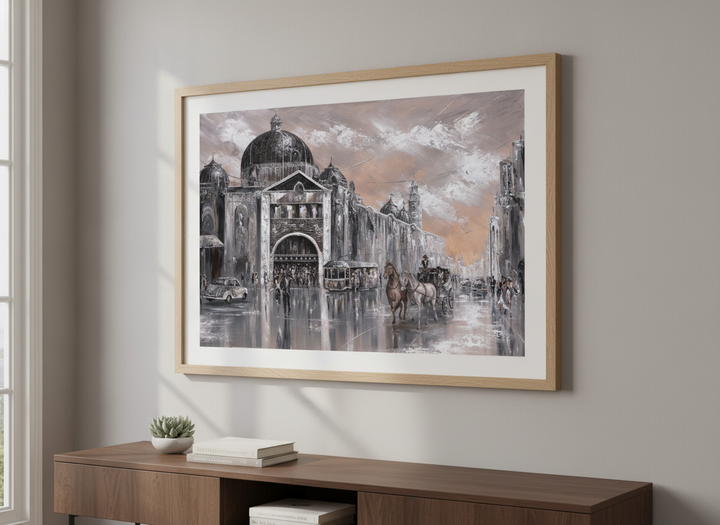 Modern wall art styled above a sofa in a neutral living room