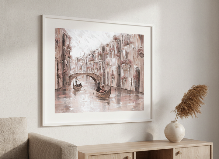 Modern wall art styled above a sofa in a neutral living room