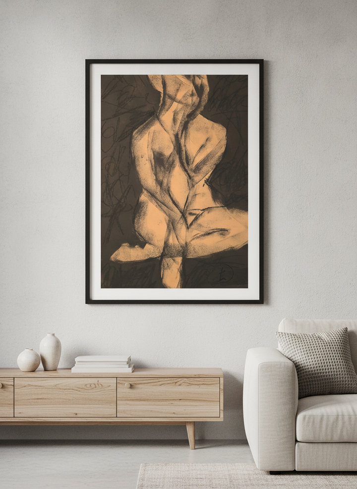Modern wall art styled above a sofa in a neutral living room