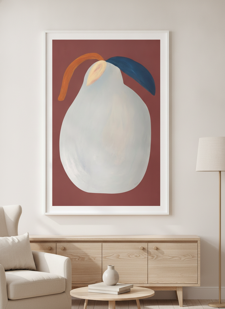 Modern wall art styled above a sofa in a neutral living room