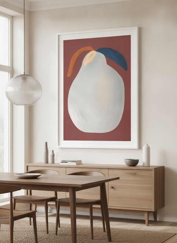 Wall art styled above a dining table in a contemporary home