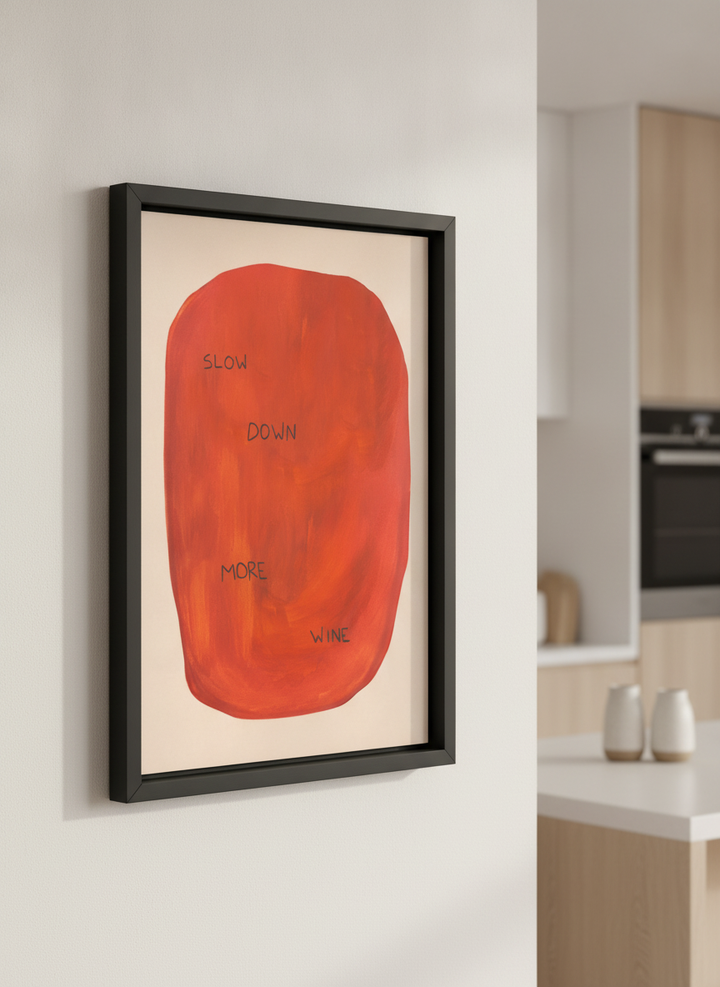 Artwork styled on the wall of a bright modern kitchen