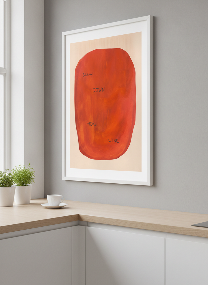 Artwork styled on the wall of a bright modern kitchen