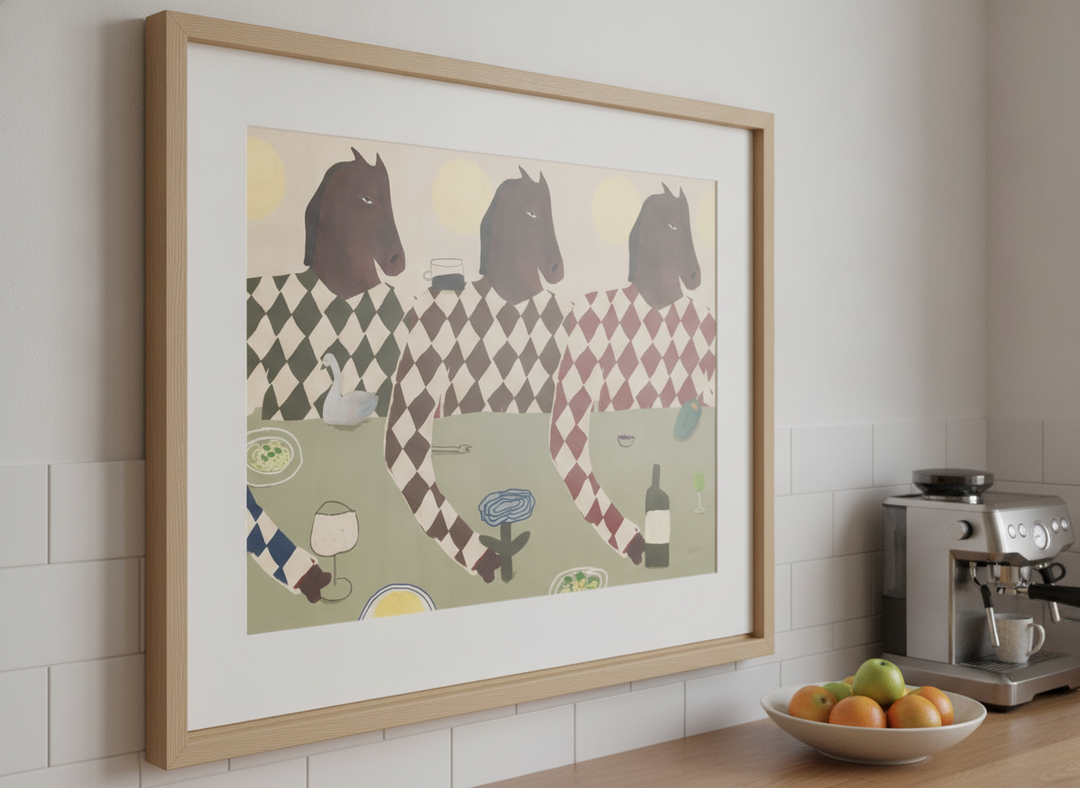 Artwork styled on the wall of a bright modern kitchen
