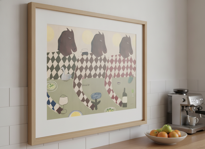 Artwork styled on the wall of a bright modern kitchen