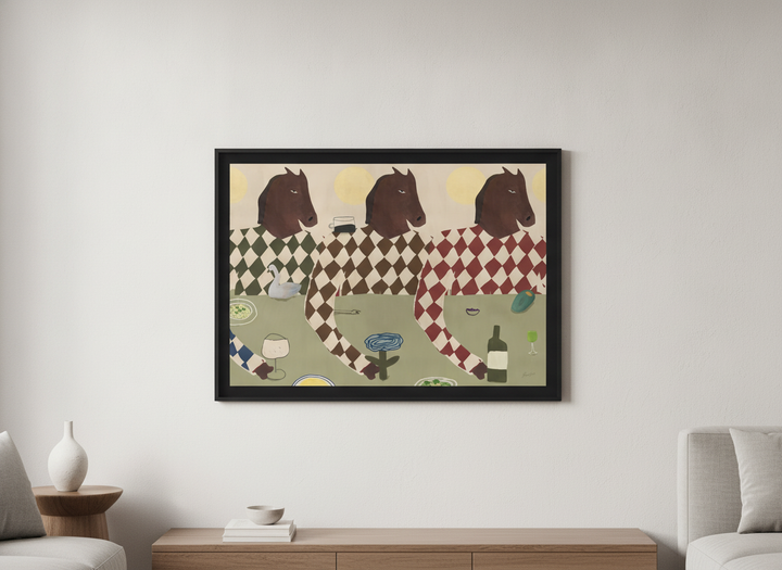 Modern wall art styled above a sofa in a neutral living room