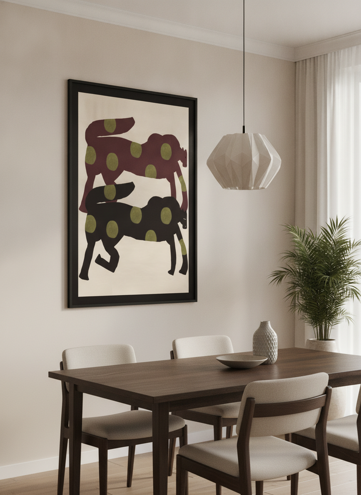 Wall art styled above a dining table in a contemporary home